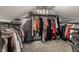 Walk-in closet with ample shelving and hanging space for organized storage at 5015 N Park Ave, Indianapolis, IN 46205