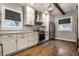 Modern kitchen featuring stainless steel appliances and bright white cabinetry at 5015 N Park Ave, Indianapolis, IN 46205