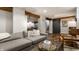 Basement Gathering room featuring exposed beams and a comfortable sectional sofa at 5015 N Park Ave, Indianapolis, IN 46205