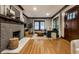 Comfortable living room with hardwood floors, fireplace, and stylish decor at 5015 N Park Ave, Indianapolis, IN 46205