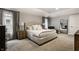 Cozy main bedroom with neutral tones, carpet flooring, and ample natural light at 5015 N Park Ave, Indianapolis, IN 46205