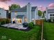 Home exterior with patio and lawn, perfect for outdoor entertaining and relaxation at 5041 Millwright Ct, Indianapolis, IN 46254