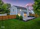 Cozy home backyard with a patio and a privacy fence, offering a great outdoor space at 5041 Millwright Ct, Indianapolis, IN 46254
