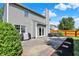 Backyard featuring a well-maintained lawn, a privacy fence, a concrete patio, and trimmed greenery at 5041 Millwright Ct, Indianapolis, IN 46254