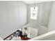 Open foyer with a high ceiling and decorative lighting fixture creating an airy and welcoming entrance at 5041 Millwright Ct, Indianapolis, IN 46254
