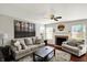 Bright living room with a fireplace, comfortable seating, and elegant decor at 5041 Millwright Ct, Indianapolis, IN 46254