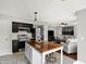 Bright open-concept kitchen and living room with modern appliances and stylish decor, perfect for entertaining at 5041 Millwright Ct, Indianapolis, IN 46254