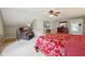 This is a bedroom with neutral carpet, ceiling fan, and recliner chair for relaxing at 5117 N Park Ave, Indianapolis, IN 46205