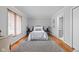 Clean bedroom with hardwood floors, closet, and access to ensuite bathroom at 5353 Chipwood Ln, Indianapolis, IN 46226