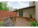 Private deck with brick accent wall, perfect for outdoor entertaining and dining at 5353 Chipwood Ln, Indianapolis, IN 46226