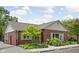 Charming brick home with beautiful landscaping and a well-manicured lawn at 5353 Chipwood Ln, Indianapolis, IN 46226
