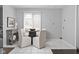 Bright kitchen featuring a breakfast nook with a glass-top table and comfortable seating at 5353 Chipwood Ln, Indianapolis, IN 46226