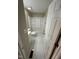Bathroom with white tiled floors, a tub and shower combo, and vanity with sink at 5735 Liberty Creek E Dr, Indianapolis, IN 46254
