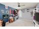Eclectic bedroom with fan, personal decor, offering space to showcase interests and hobbies at 5913 Monticello Square Ln, Indianapolis, IN 46234