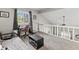 Cozy spare bedroom with futon, work desk and natural light at 601 Conner Creek Dr, Fishers, IN 46038