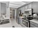 Well-equipped kitchen featuring stainless steel appliances and a sink, perfect for cooking and entertaining at 601 Conner Creek Dr, Fishers, IN 46038