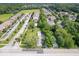 An aerial view of the neighborhood, pool, homes and greenery at 606 E County Line Rd, Indianapolis, IN 46227