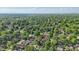 Aerial view of a residential area filled with trees and various home designs at 6102 Primrose Ave, Indianapolis, IN 46220