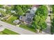 The home features a driveway, a well kept lawn, and a private backyard deck at 6102 Primrose Ave, Indianapolis, IN 46220