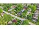 The aerial shot captures a tree lined neighborhood, offering a scenic place to live at 6102 Primrose Ave, Indianapolis, IN 46220