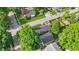 A charming home featuring a wooden deck, a lush lawn, and a fenced backyard at 6102 Primrose Ave, Indianapolis, IN 46220