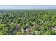 Residential neighborhood abundant with mature trees and diverse housing styles at 6102 Primrose Ave, Indianapolis, IN 46220