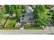 The home features a driveway, a well kept lawn, and a private backyard deck at 6102 Primrose Ave, Indianapolis, IN 46220