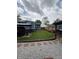 Spacious backyard with brick paver area and grass lawn at 6126 Regina Cir, Indianapolis, IN 46224