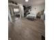 Spacious bedroom with large mirrored closet doors and natural light at 6126 Regina Cir, Indianapolis, IN 46224