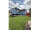 Exterior of home with a beautifully landscaped yard at 6126 Regina Cir, Indianapolis, IN 46224