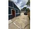Charming home with red door, long driveway and detached garage at 6126 Regina Cir, Indianapolis, IN 46224
