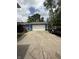 Spacious garage with basketball hoop and trailer at 6126 Regina Cir, Indianapolis, IN 46224
