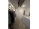 Functional laundry room with tiled flooring, washer, and dryer at 6126 Regina Cir, Indianapolis, IN 46224