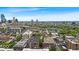 Wide aerial view shows downtown buildings and surrounding landscape at 630 N College Ave # 105, Indianapolis, IN 46204