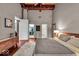Large bedroom boasting gorgeous hardwoods, an open closet, and lots of light at 630 N College Ave # 105, Indianapolis, IN 46204