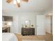 Comfortable bedroom provides ample closet space and a view of a stylish dresser with mirror at 6579 Aster Dr, Pendleton, IN 46064