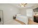 Bright bedroom offers neutral decor and carpeted floors, complemented by a modern bedside table at 6579 Aster Dr, Pendleton, IN 46064