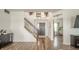 Inviting foyer with a staircase, hardwood floors, and access to various living spaces at 6579 Aster Dr, Pendleton, IN 46064