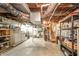 Spacious unfinished basement with visible ductwork, laundry area, and potential for customization at 6762 S State Road 67, Pendleton, IN 46064