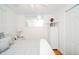 Bright bedroom with white walls, comfortable bed, and plenty of natural light at 6762 S State Road 67, Pendleton, IN 46064