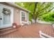 Charming porch with outdoor furniture and swing creating a peaceful, inviting space at 6762 S State Road 67, Pendleton, IN 46064