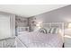 Charming bedroom featuring a crib and a comfortable bed with a neutral color palette at 6833 Bluffridge Ln, Indianapolis, IN 46278