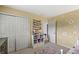 Bedroom featuring a closet, a doorway, and shelving for ample storage at 6833 Bluffridge Ln, Indianapolis, IN 46278