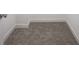 Close-up of neutral colored carpet with white baseboards at 6871 Adalene Ln, Carmel, IN 46033