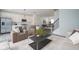 Spacious living area with open layout, connecting the kitchen, dining, and living space for seamless entertaining at 6871 Adalene Ln, Carmel, IN 46033