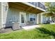 Private outdoor patio features a table, chairs, and easy access to a walkout basement at 6871 Adalene Ln, Carmel, IN 46033