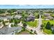 Wide aerial shot capturing the home, landscaping, and the surrounding neighborhood at 7116 Trail Ridge Ln, Indianapolis, IN 46259