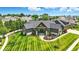Expansive aerial view of home showcasing landscaping, and inviting entrance at 7116 Trail Ridge Ln, Indianapolis, IN 46259
