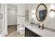 Elegant bathroom features granite vanity and modern fixtures, offering style and function at 7116 Trail Ridge Ln, Indianapolis, IN 46259