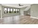 Light and airy bedroom offers wood floors, neutral walls, recessed lights and plenty of natural light at 7116 Trail Ridge Ln, Indianapolis, IN 46259